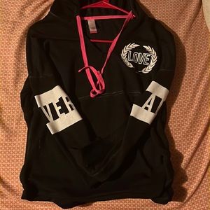 Size small. black with pink and white.